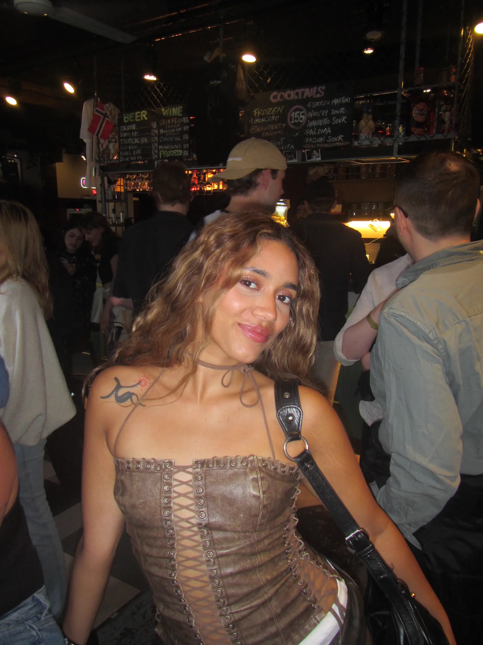 A guest arriving at the first bar of the night