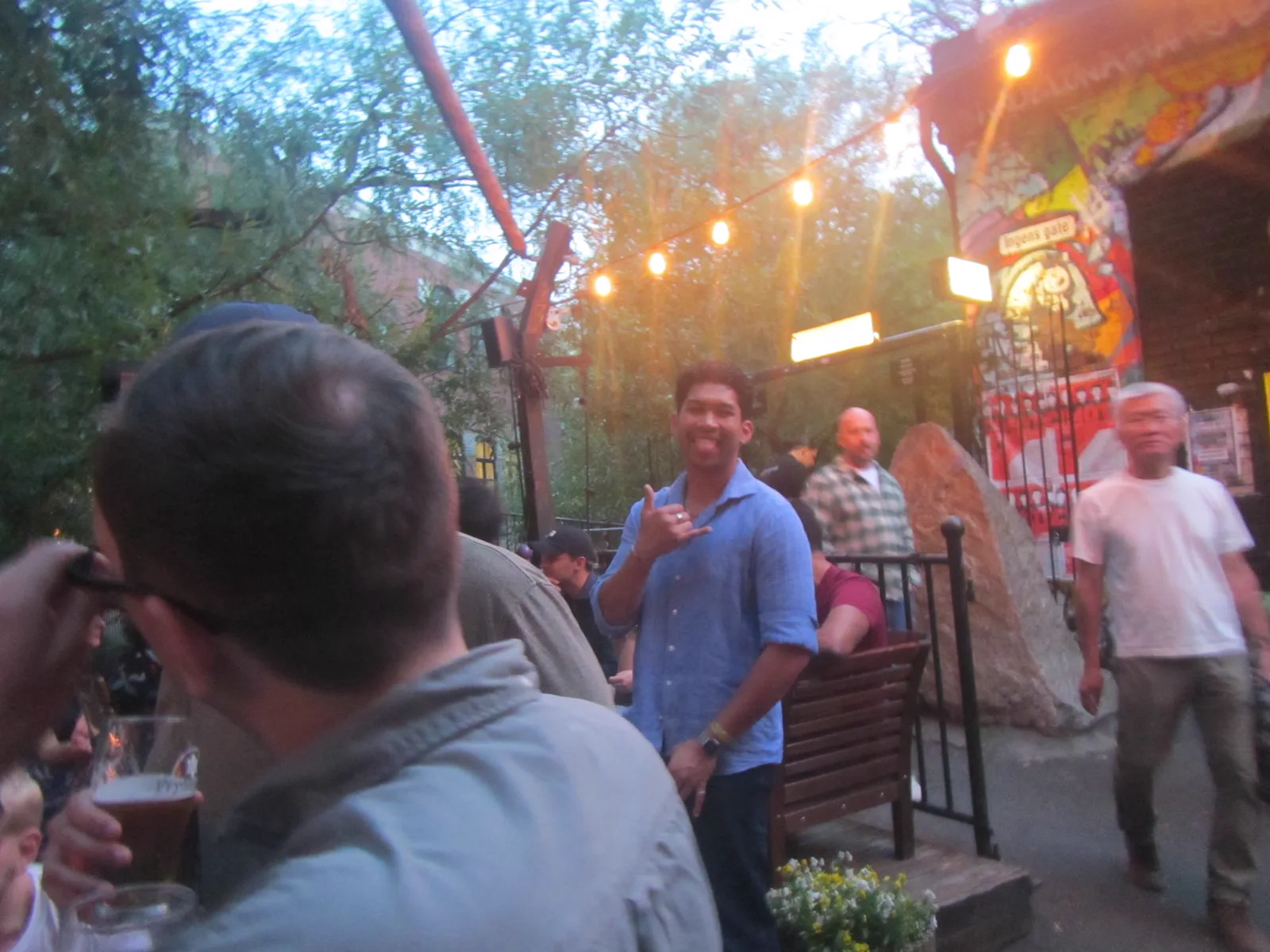 The group gathering beneath the lights in the BLÅ courtyard